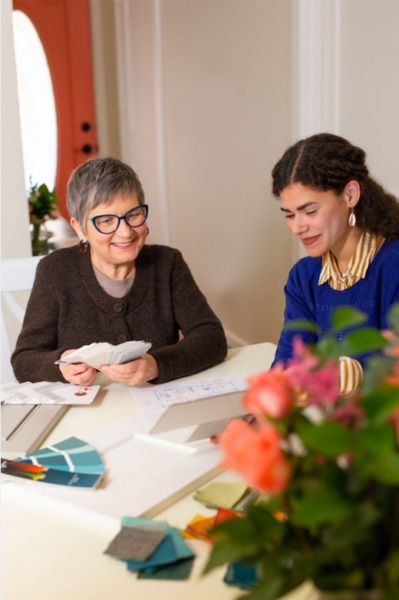 Interior designer helping client in home