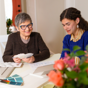 Interior designer helping client in home